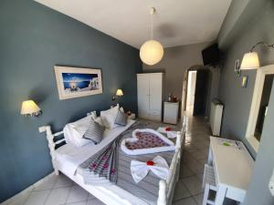 Llit o llits en una habitació de Nostos Beach