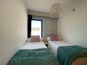 Łóżko lub łóżka w pokoju w obiekcie Villa Gaumet by Villalia