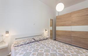 Posteľ alebo postele v izbe v ubytovaní Apartment Vedran with Pool
