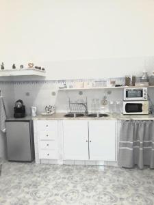 Kuchyň nebo kuchyňský kout v ubytování Franco-Home