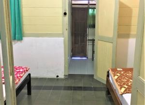 Rúm í herbergi á Hotel Wismancala Kaliurang