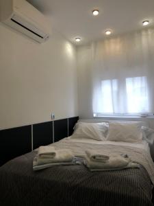 Cama o camas de una habitación en ASV Apartments