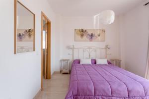 Posteľ alebo postele v izbe v ubytovaní Apartamento Corazón de Nerja