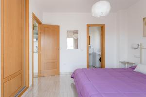 Posteľ alebo postele v izbe v ubytovaní Apartamento Corazón de Nerja