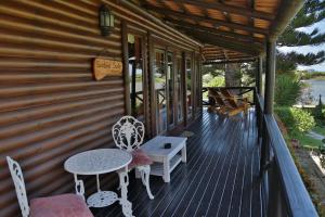 Balkón nebo terasa v ubytování Waterside Lodge