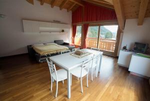 A bed or beds in a room at Residence Rose