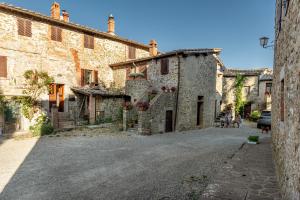 an empty street in an old stone building at Casa Dovi in Rosennano