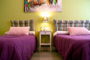 מיטה או מיטות בחדר ב-Chueca - Room Apartments