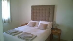 Katil atau katil-katil dalam bilik di Casita Estilo