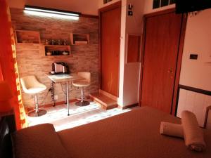 TV a/nebo společenská místnost v ubytování B&B Alghero Republic