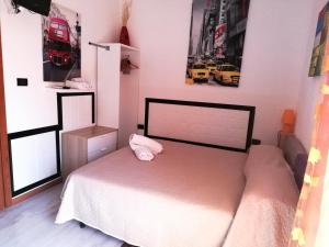 Postel nebo postele na pokoji v ubytování B&B Alghero Republic