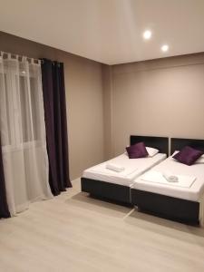 A bed or beds in a room at VILIN