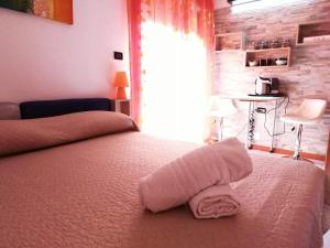 Postel nebo postele na pokoji v ubytování B&B Alghero Republic