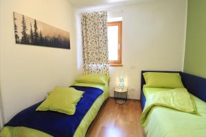 Ein Bett oder Betten in einem Zimmer der Unterkunft Haus Martina by ISA AGENTUR