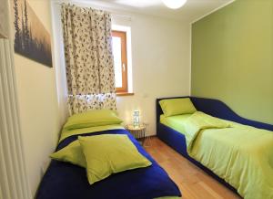 Ein Bett oder Betten in einem Zimmer der Unterkunft Haus Martina by ISA AGENTUR