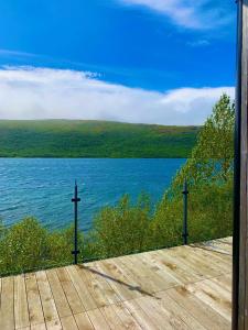 a view of a body of water with two crosses at Riverside Cottage in Lundur