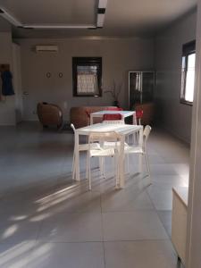 A seating area at Amapolas - Villaggio & Camping