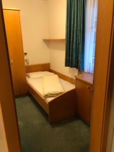 Postel nebo postele na pokoji v ubytování Hotel Residence Lorenz