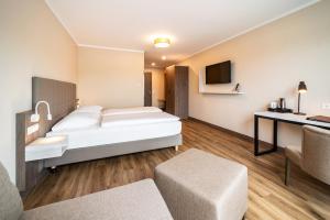 Postel nebo postele na pokoji v ubytování Hotel Spree-idyll