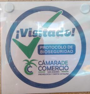 Um certificado, prêmio, placa ou outro documento exibido em Posada San Nicolas
