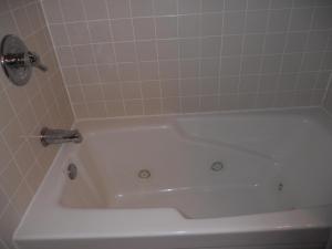 a white bath tub in a bathroom at Oak Square 309 in Gatlinburg