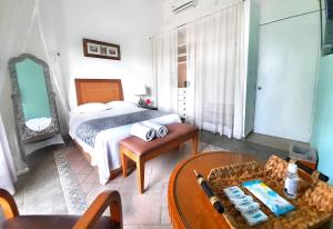 Giường trong phòng chung tại Casa Lara - Habitación cerca del mar - Homestay