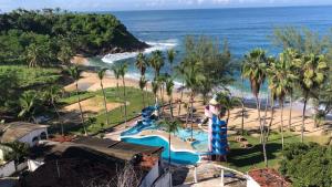 an aerial view of a water park with a water slide at Hotel Villa Mexicana Puerto Escondido in Puerto Escondido +17 photos