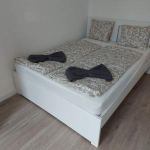Posteľ alebo postele v izbe v ubytovaní Aranyhíd Apartman Balatonalmádi