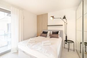 Ένα ή περισσότερα κρεβάτια σε δωμάτιο στο Top View Balticus 82 by Renters