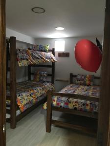Postel nebo postele na pokoji v ubytování Hotel Palmi
