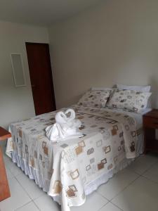 Cama ou camas em um quarto em Pousada Paraíso dos Milagres
