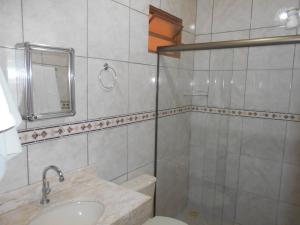 Phòng tắm tại Pousada Paraiso