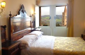 Ліжко або ліжка в номері Hotel Raffaello - Self Check-in Free