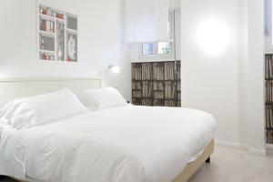 Postel nebo postele na pokoji v ubytování Domus Municipio