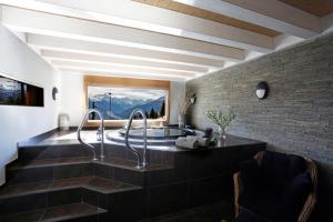 Posezení v ubytování Crans Luxury Lodges