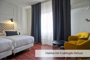 Postel nebo postele na pokoji v ubytování Hotel Montermoso