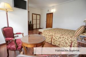 Postel nebo postele na pokoji v ubytování Hotel Montermoso