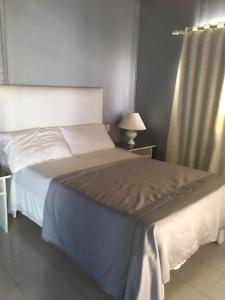 Postel nebo postele na pokoji v ubytování Hotel Maracas Punta Cana