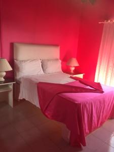 Postel nebo postele na pokoji v ubytování Hotel Maracas Punta Cana