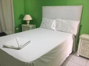 Postel nebo postele na pokoji v ubytování Hotel Maracas Punta Cana