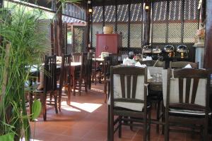 Un restaurant sau alt loc unde se poate mânca la Alana Luang Prabang
