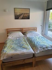 Posteľ alebo postele v izbe v ubytovaní Apartments ChezTom Nenzing