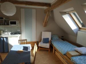 Postel nebo postele na pokoji v ubytování Apartmán Švandovi