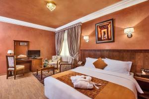 Postel nebo postele na pokoji v ubytování Hôtel Club Val d'Anfa Casablanca Ocean view