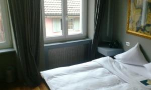 Voodi või voodid majutusasutuse Hotel Limmatblick toas