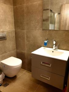 A bathroom at StelDi Luxury Apartments