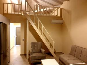 A seating area at StelDi Luxury Apartments