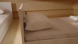 A bed or beds in a room at StelDi Luxury Apartments