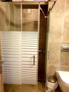 A bathroom at StelDi Luxury Apartments Még 12 kép