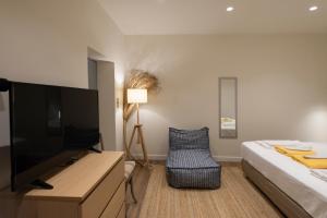 Postel nebo postele na pokoji v ubytování Pylosea Luxury Lodge
